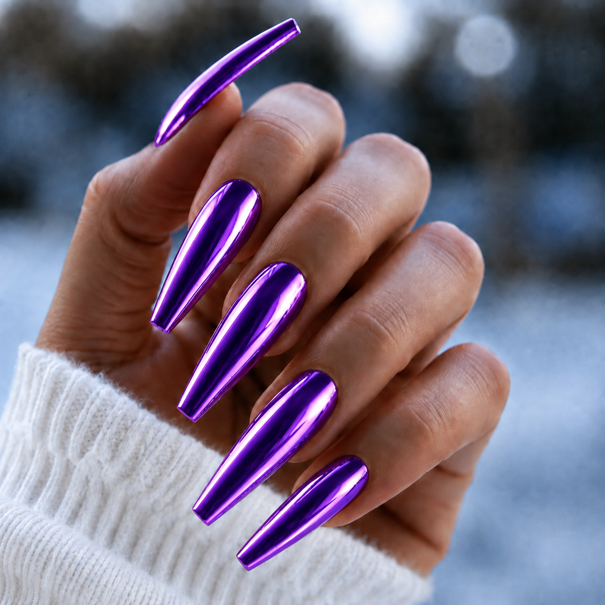 Finished manicured nails with a high-shine liquid metal effect using BEMI Chrome in Chroma Purple, burnished flawlessly over a gel base for professional nail artistry.