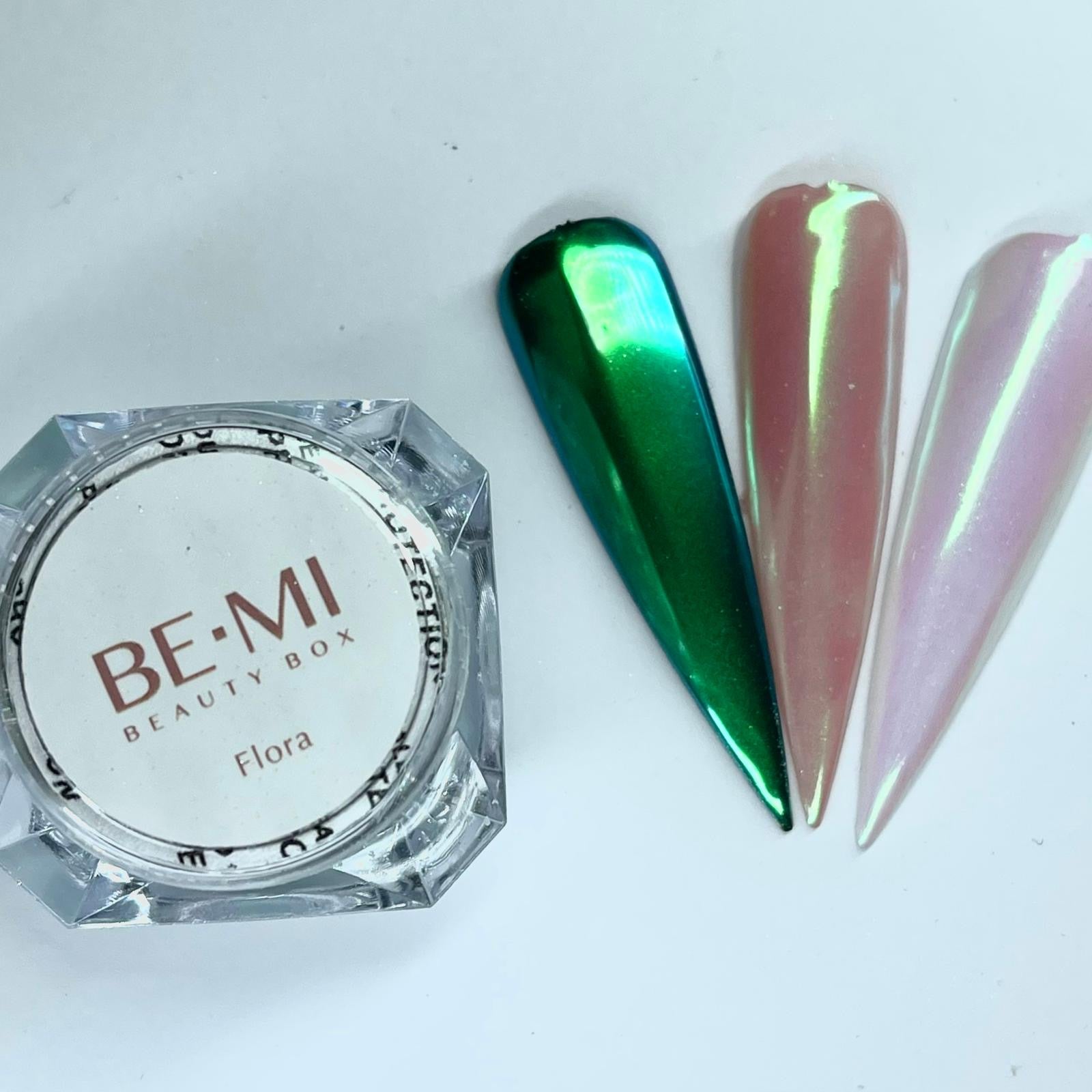 Finished manicured nails with a high-shine liquid metal effect using BEMI Chrome in Flora, burnished flawlessly over a gel base for professional nail artistry.