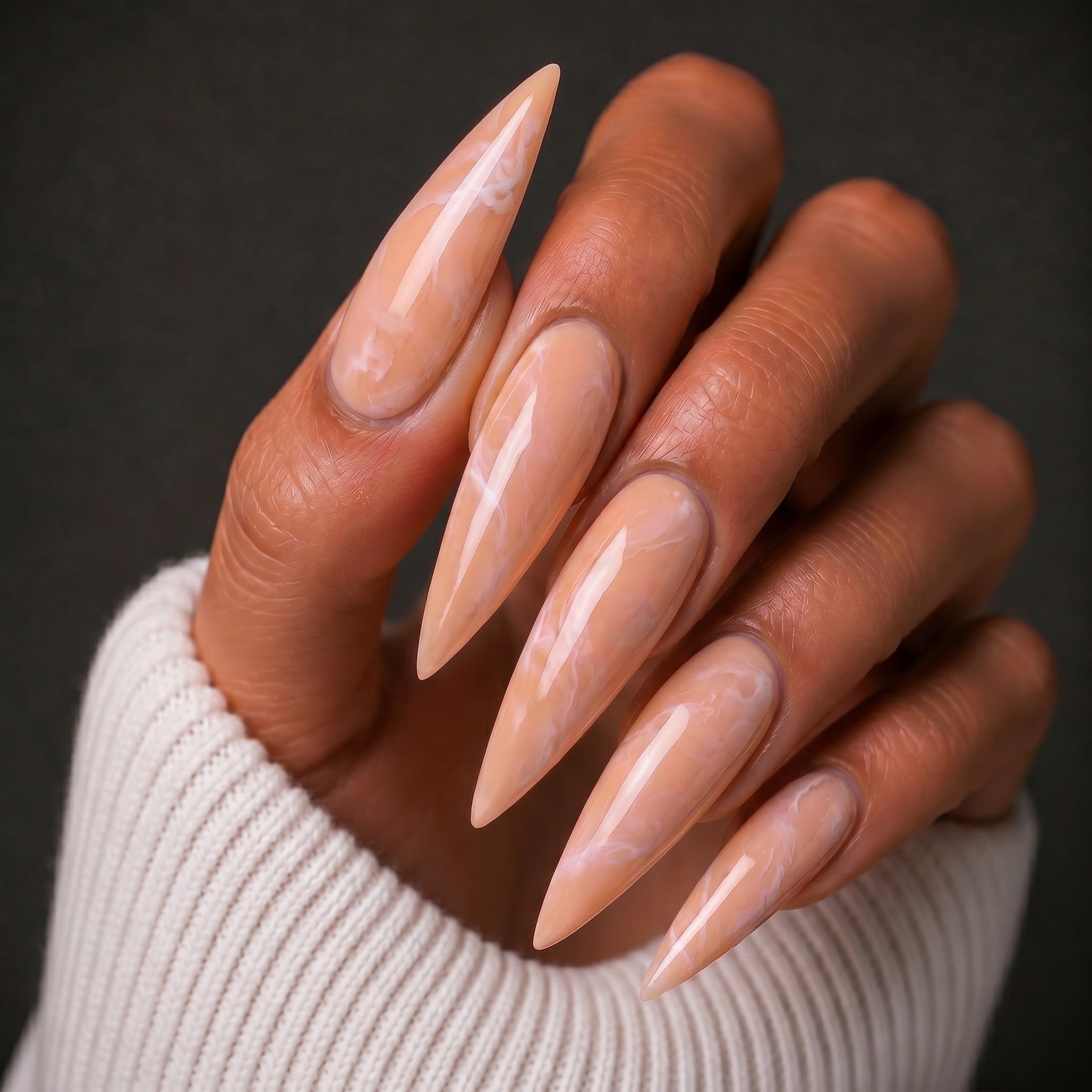 Finished manicured nails using BEMI Quartz Gel Polish in Peach, demonstrating soft translucence, luminous depth, and a refined, professional finish.