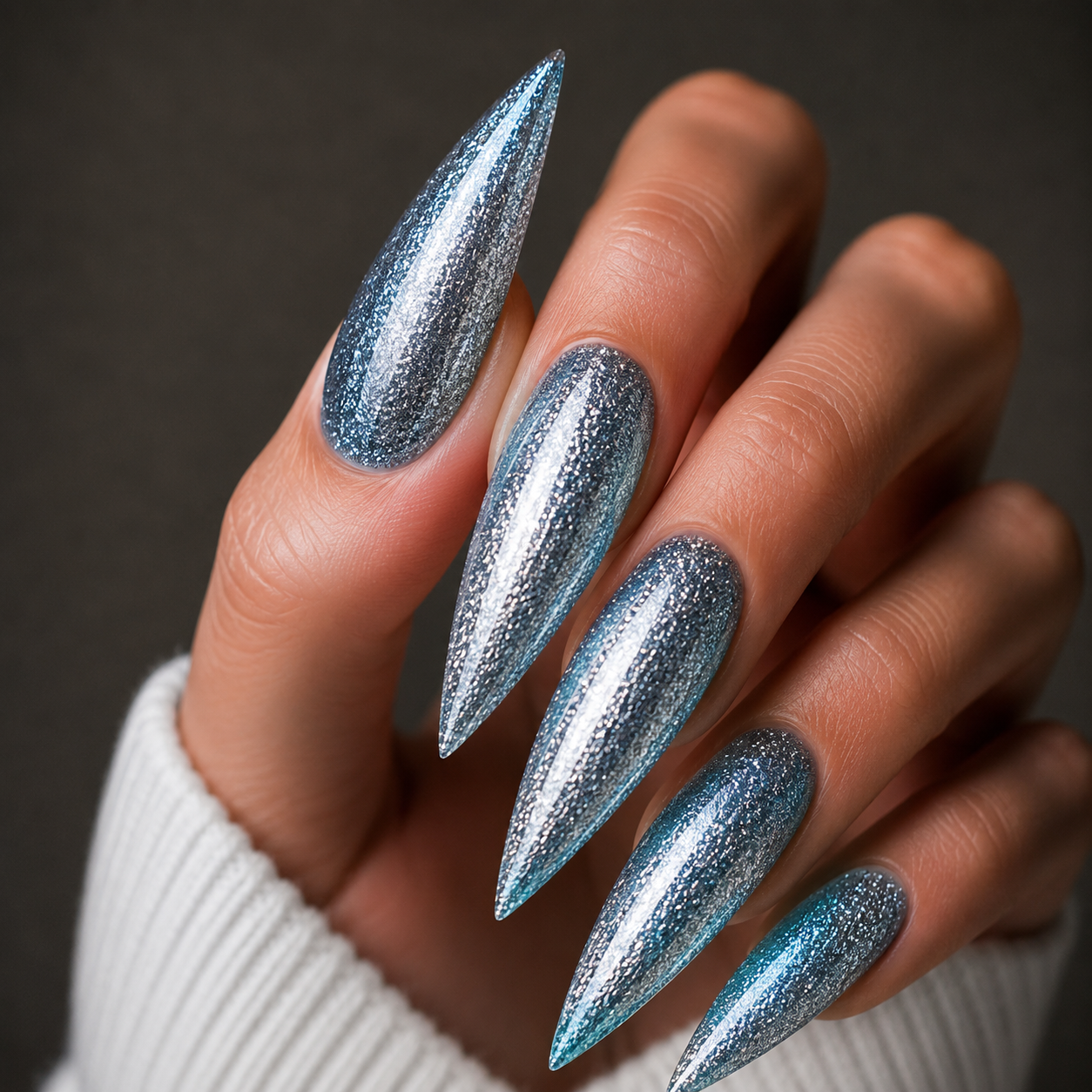 Finished manicured nails using BEMI Metal Leaf Gel in Sky, demonstrating a multidimensional, metallic effect and a flawless, professional finish.