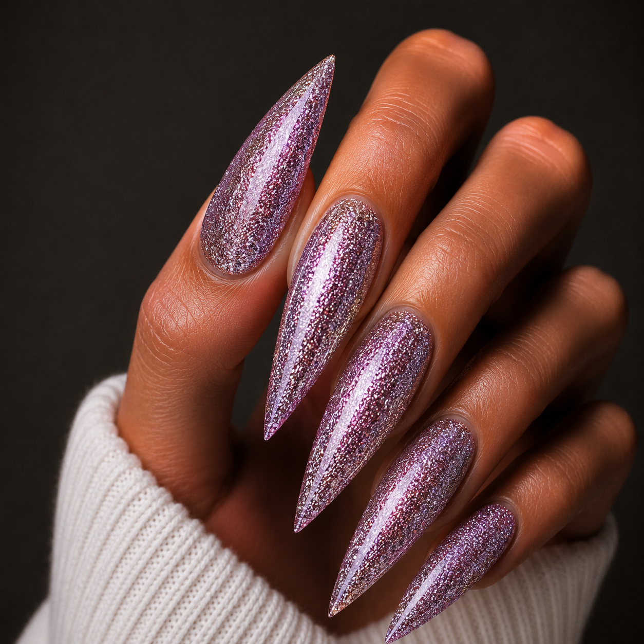 Finished manicured nails using BEMI Metal Leaf Gel in Blush, demonstrating a multidimensional, metallic effect and a flawless, professional finish.