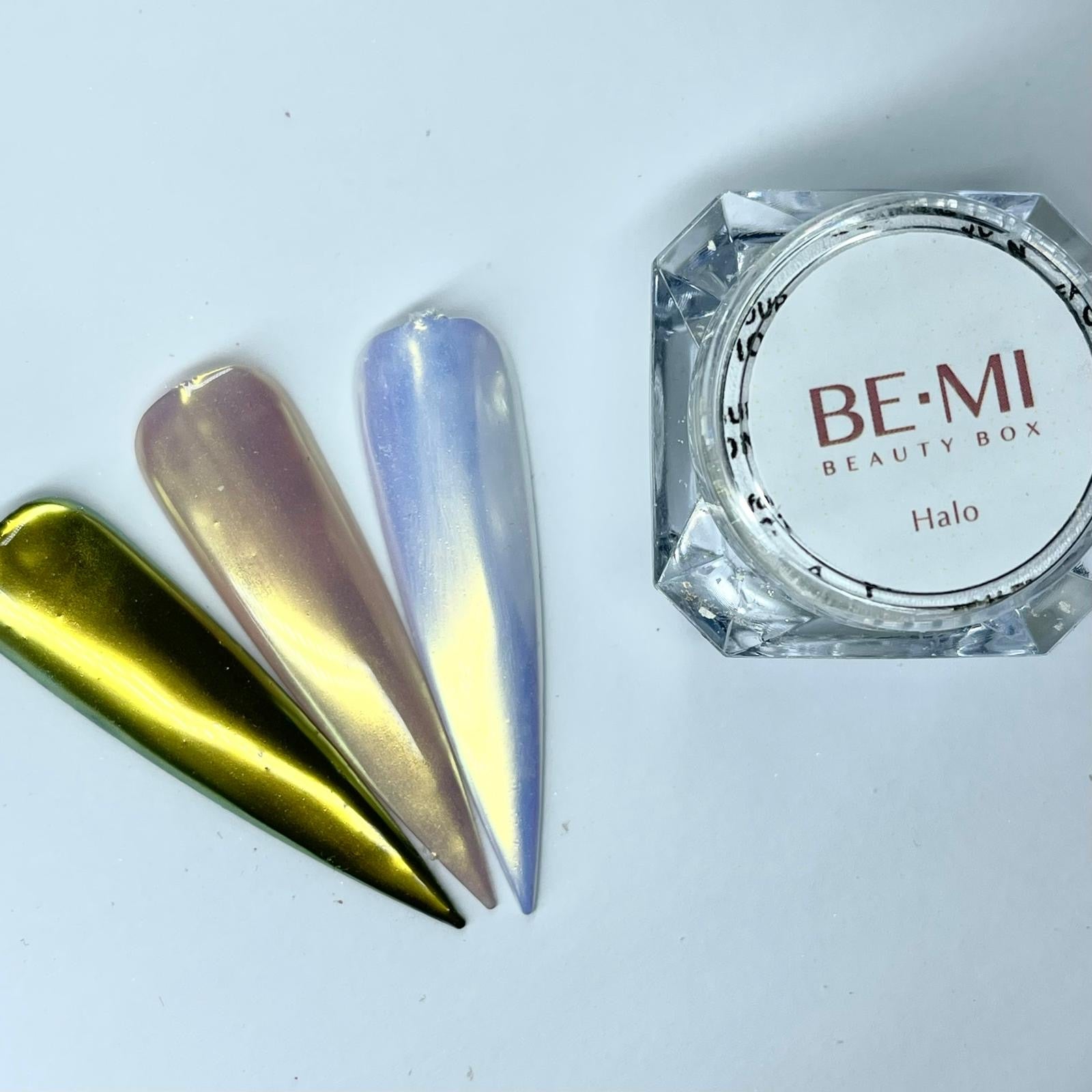 Finished manicured nails with a high-shine liquid metal effect using BEMI Chrome in Halo, burnished flawlessly over a gel base for professional nail artistry.