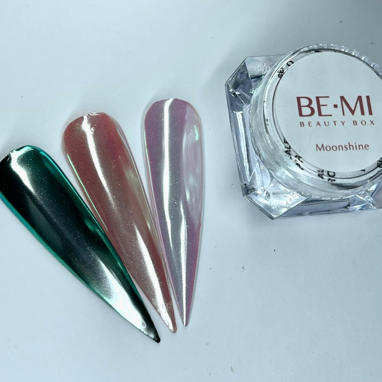 Finished manicured nails with a high-shine liquid metal effect using BEMI Chrome in Moonshine, burnished flawlessly over a gel base for professional nail artistry.