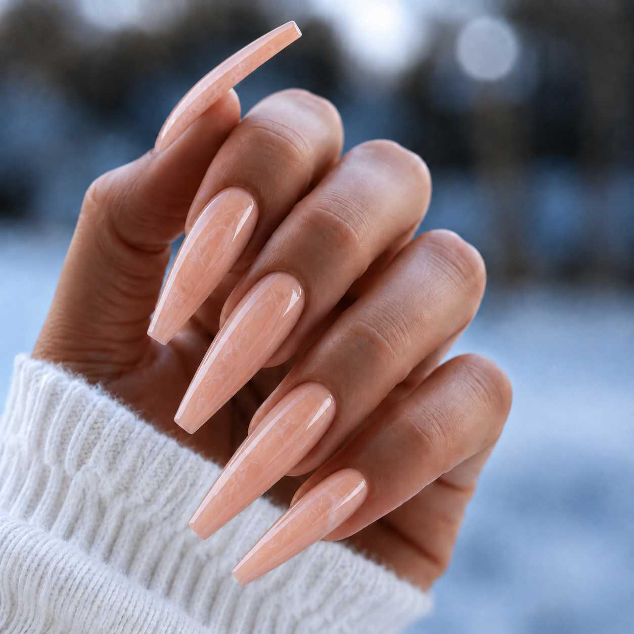 Finished manicured nails using BEMI Quartz Gel Polish in Peach, demonstrating soft translucence, luminous depth, and a refined, professional finish.