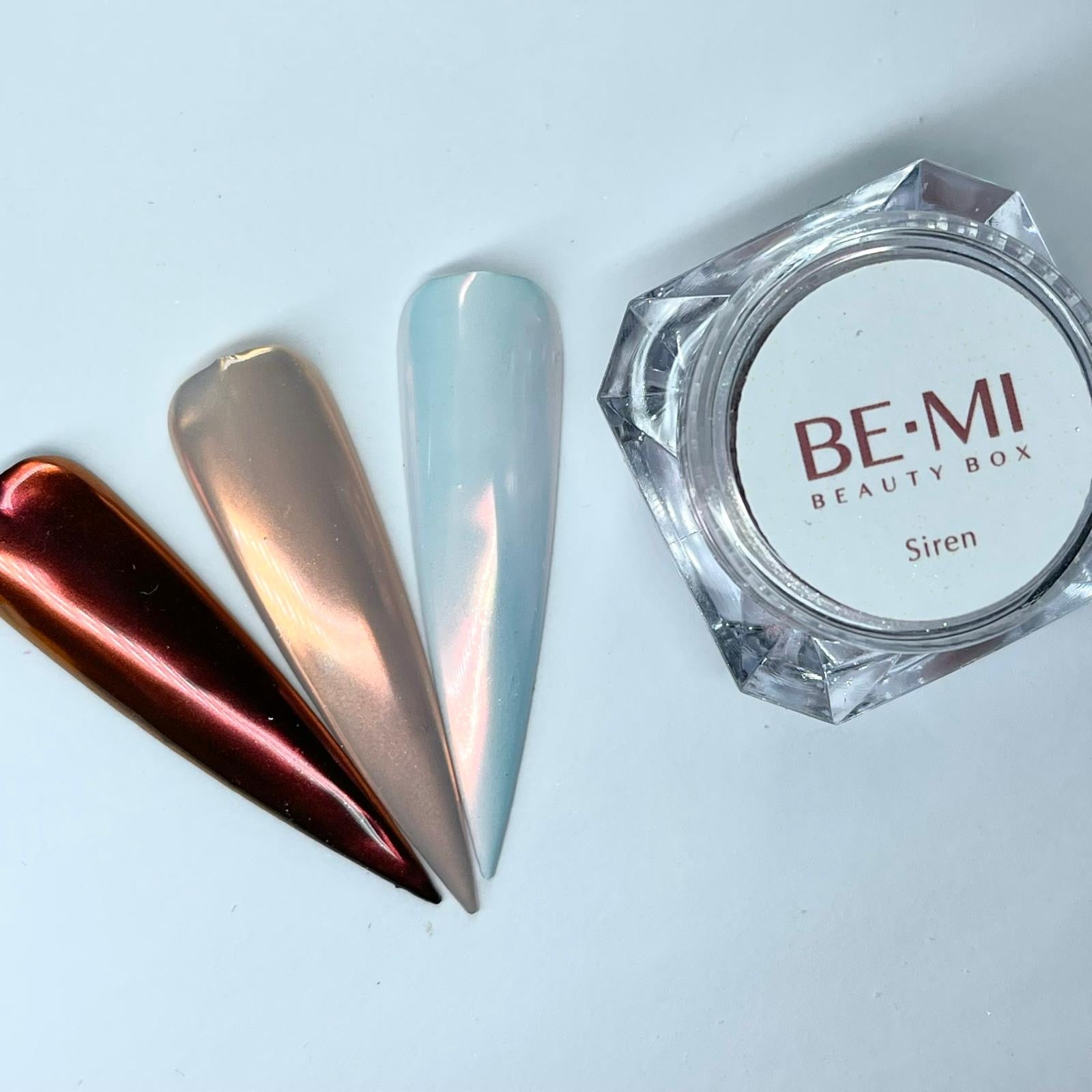 Finished manicured nails with a high-shine liquid metal effect using BEMI Chrome in Siren, burnished flawlessly over a gel base for professional nail artistry.