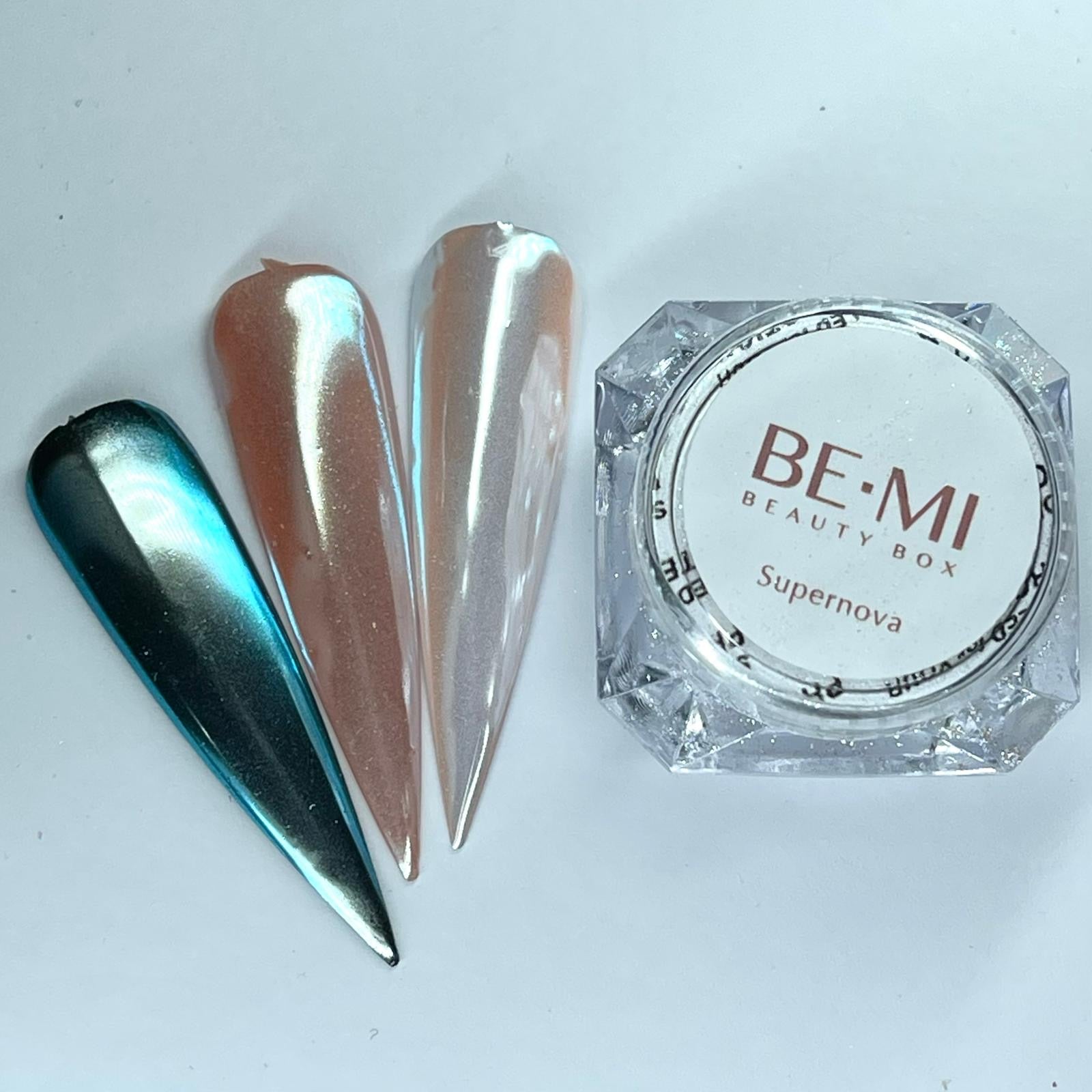 Finished manicured nails with a high-shine liquid metal effect using BEMI Chrome in Supernova, burnished flawlessly over a gel base for professional nail artistry.