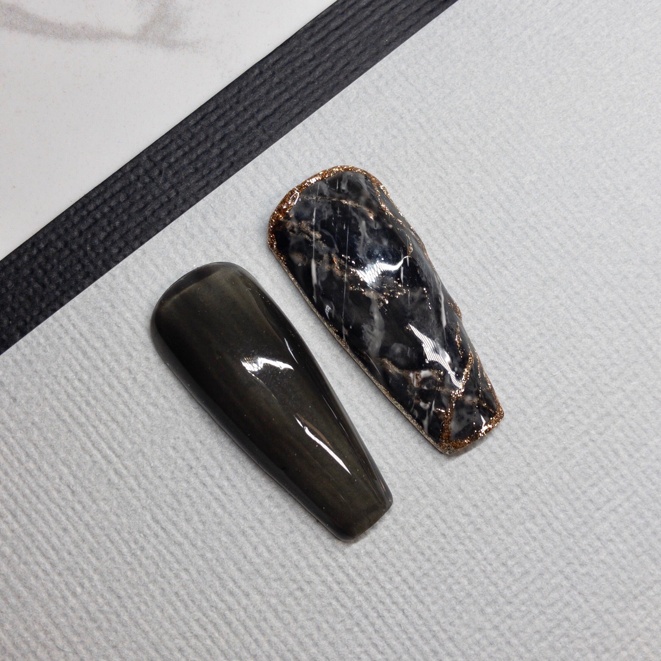 Finished manicured nails using BEMI Quartz Gel Polish in Smoke, demonstrating soft translucence, luminous depth, and a refined, professional finish.