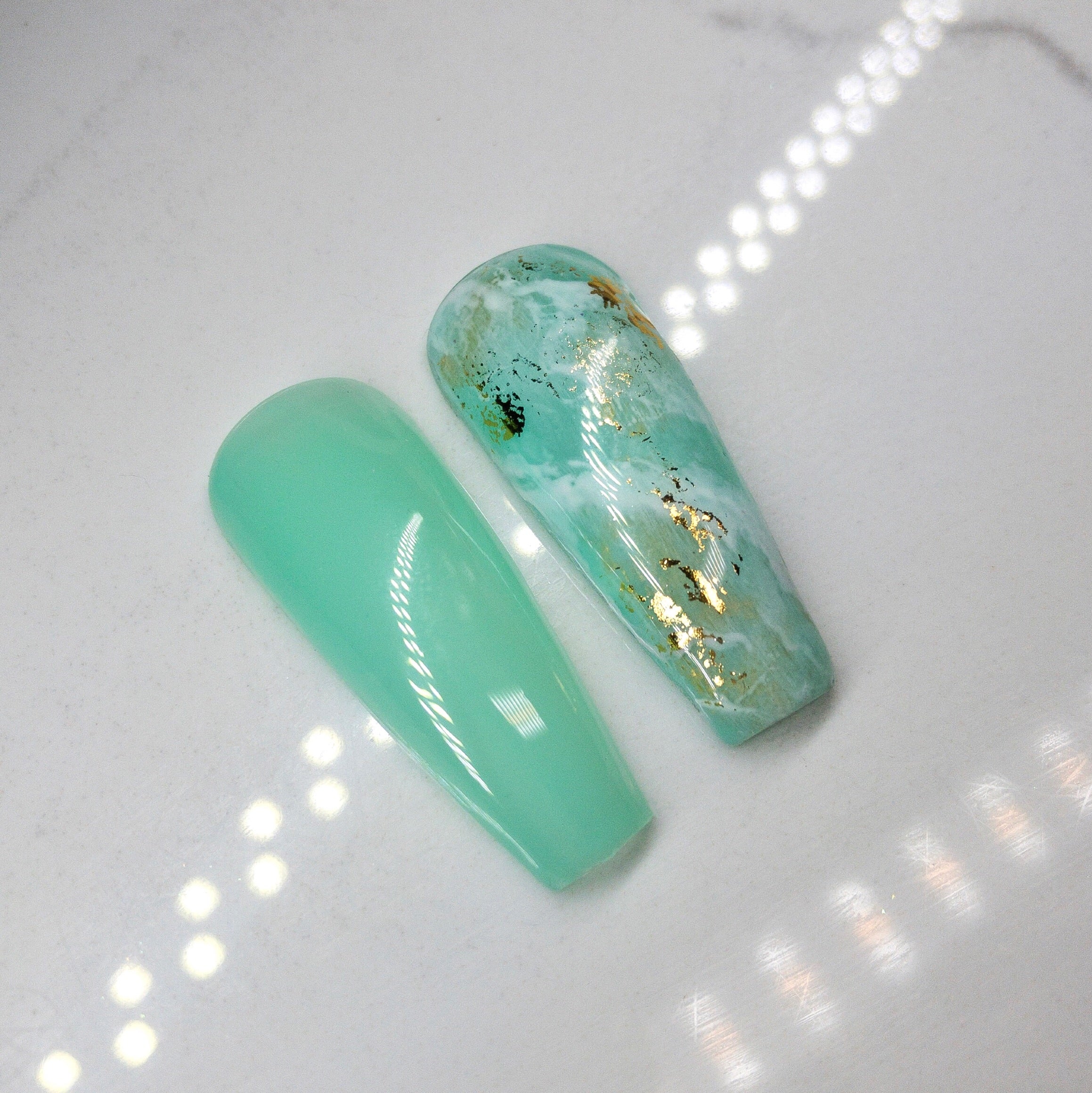 Finished manicured nails using BEMI Quartz Gel Polish in Amazon, demonstrating soft translucence, luminous depth, and a refined, professional finish.