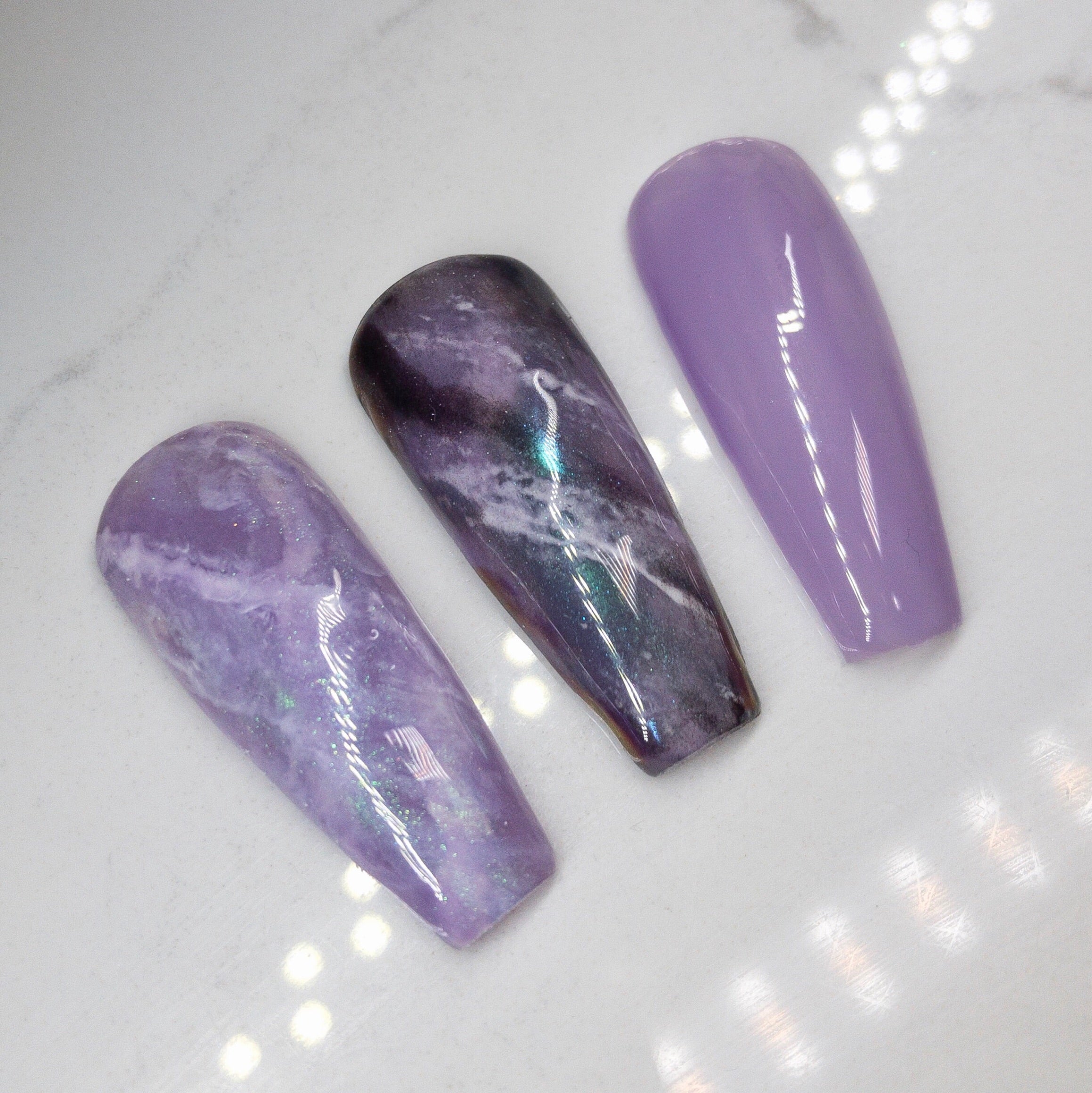 Finished manicured nails using BEMI Quartz Gel Polish in Lavender, demonstrating soft translucence, luminous depth, and a refined, professional finish.