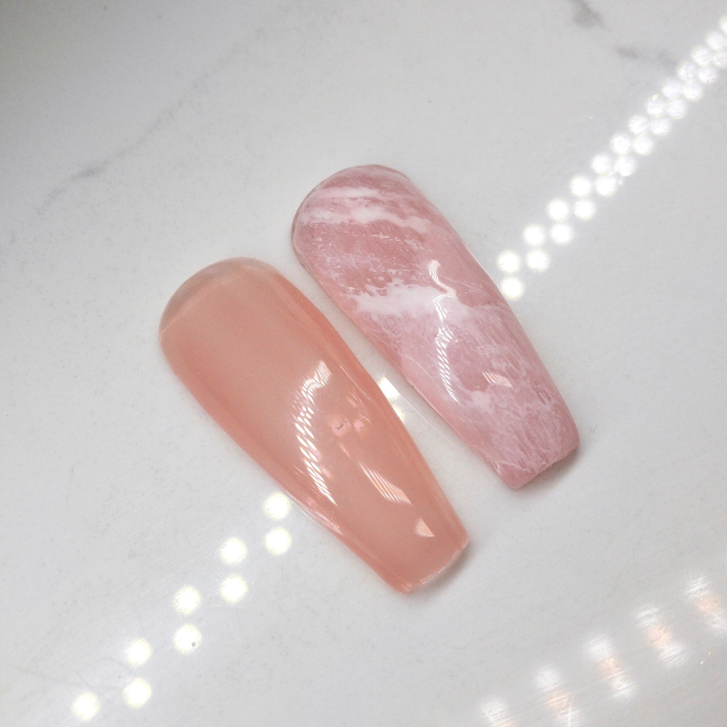 Finished manicured nails using BEMI Quartz Gel Polish in Rose, demonstrating soft translucence, luminous depth, and a refined, professional finish.