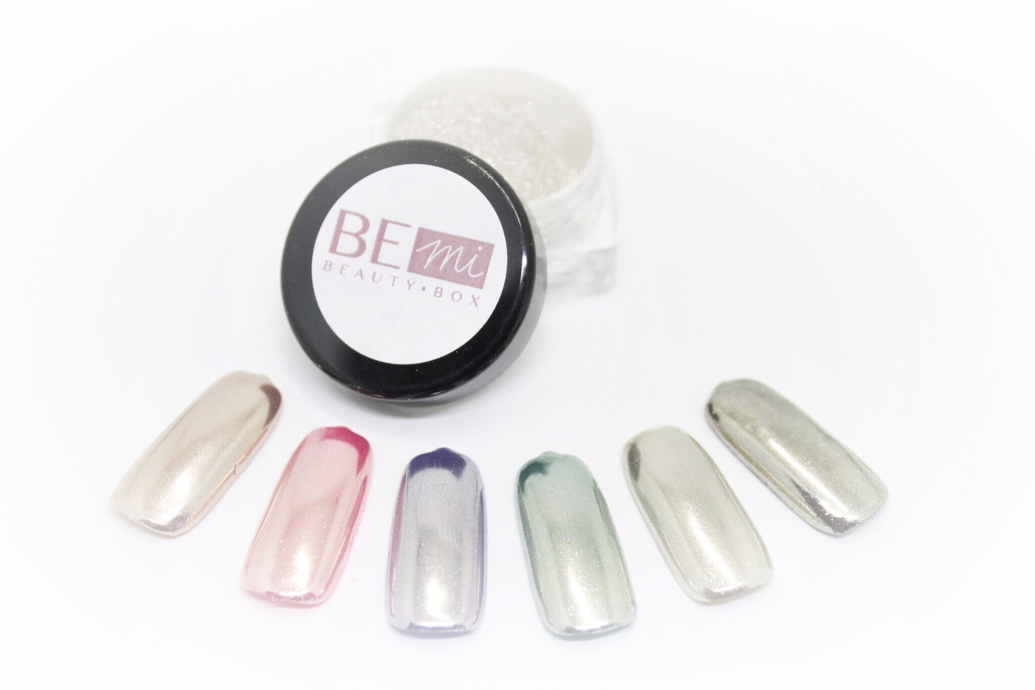 Finished manicured nails with a high-shine liquid metal effect using BEMI Chrome in Silver Mirror, burnished flawlessly over a gel base for professional nail artistry.